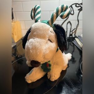 Cute little pup 🐶 interactive toy 🧸 more like Christmas music vibes